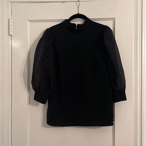 Ted Baker London. Black blouse. Never worn. Size medium.